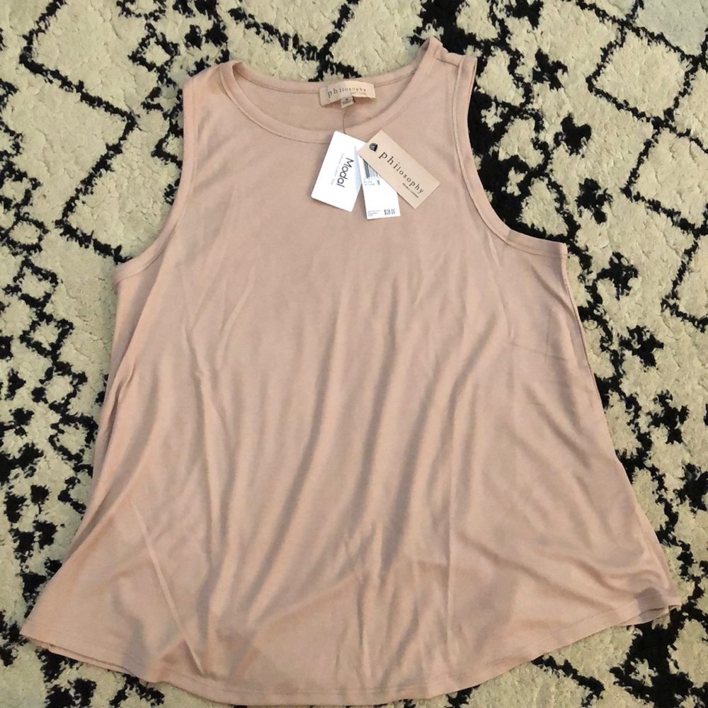 Philosophy swing tank